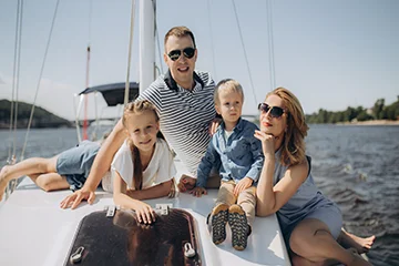 Family enjoying a sailing trip